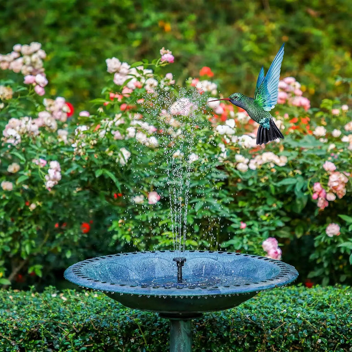 Solar powered fountain in garden